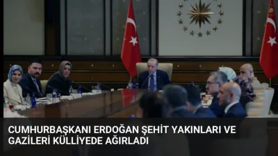 Cumhurbaşkanı Erdoğan, Cumhurbaşkanlığı Külliyesi'nde şehit yakınları ve gazilerle bir araya